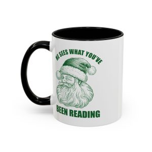 Two-tone Christmas mug with winking Santa and quote ‘He Sees What You’ve Been Reading’