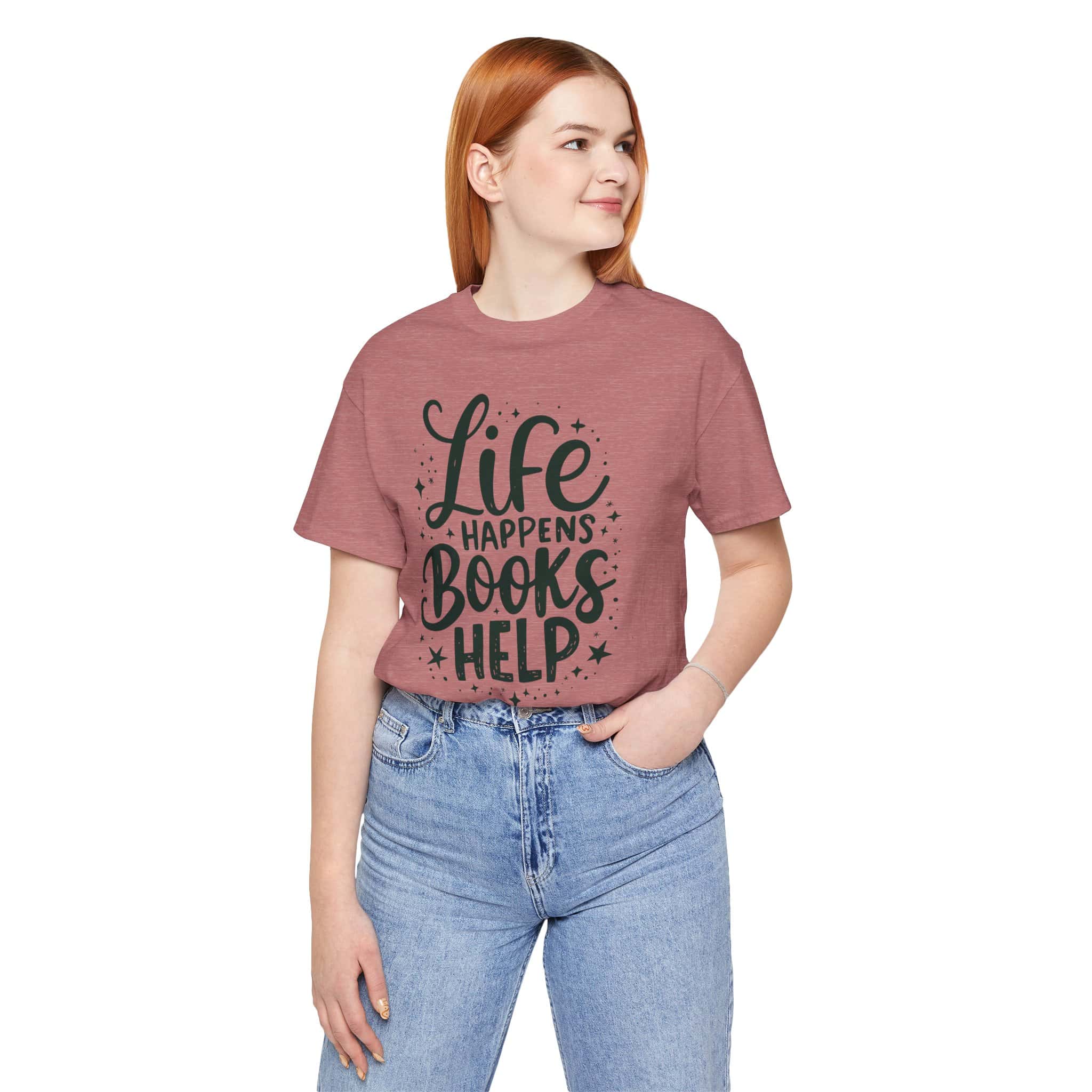 Soft unisex t-shirt with text reading "Life Happens, Books Help" in dreamy bookish colors, designed for book lovers by Book Cave