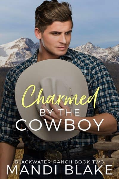 Cover for Charmed by the Cowboy